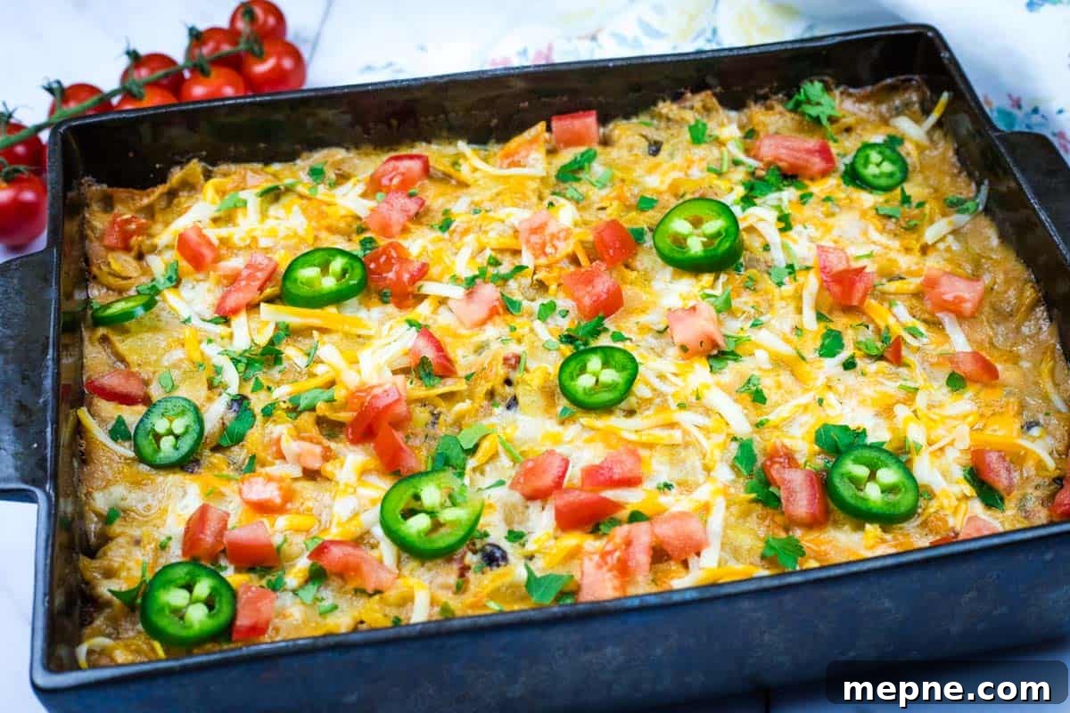 35 Classic Casserole Recipes That Have Everyone Coming Back 23 Mexican Chicken Casserole on a rectangular pan.