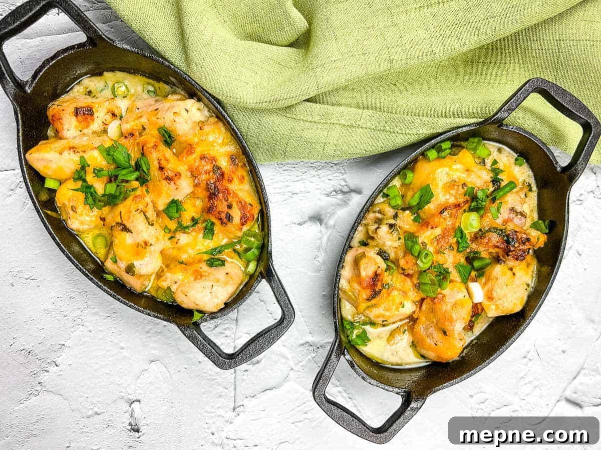 35 Classic Casserole Recipes That Have Everyone Coming Back 29 Two skillets filled with chicken and vegetables on a white background.