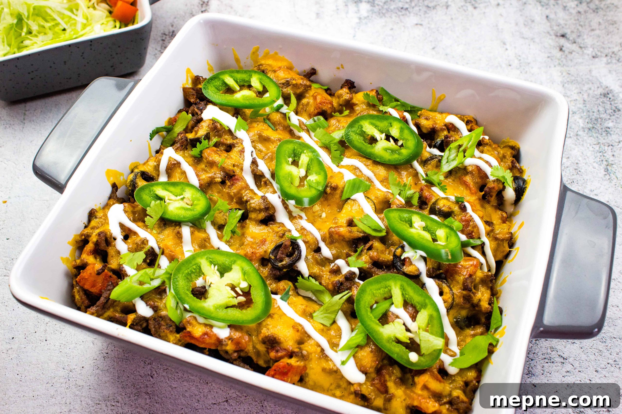 35 Classic Casserole Recipes That Have Everyone Coming Back 35 A Taco Casserole dish with black beans, cheese and jalapenos.