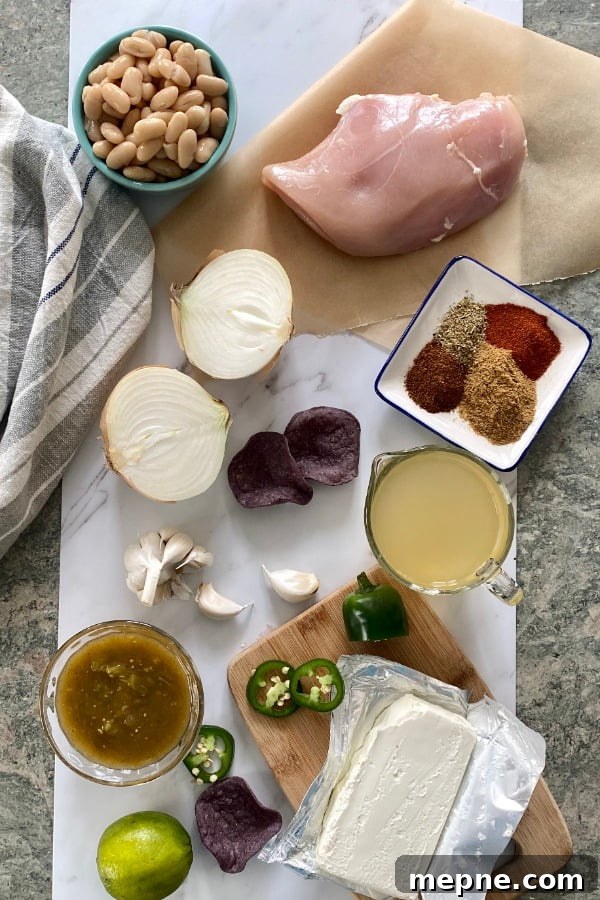Instant Pot Chicken Enchilada Soup (Creamy) 3 ingredients for soup with chicken and salsa verde