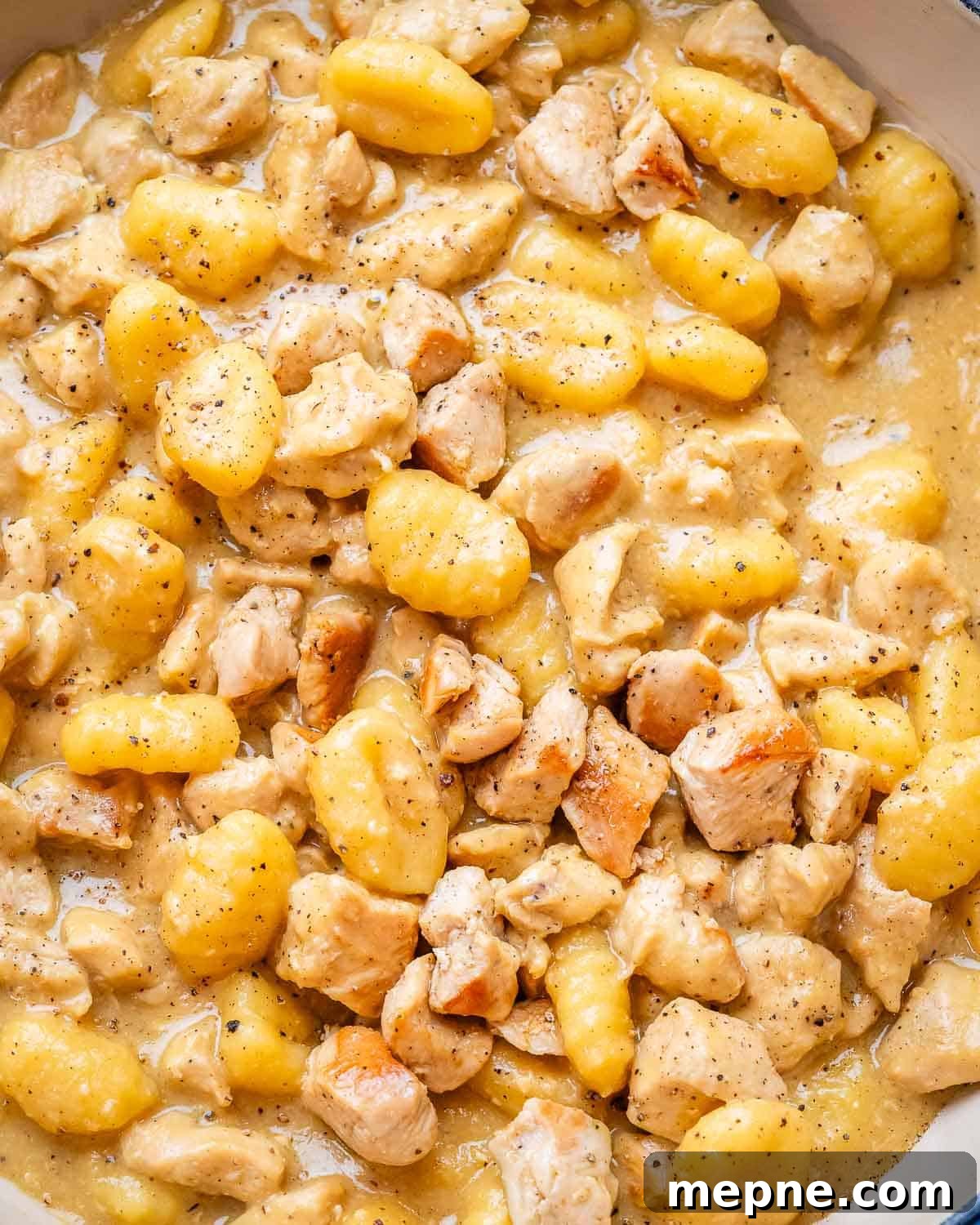 Gnocchi Carbonara: Creamy Pancetta and Parmesan 2 A close up image of one pan gnocchi carbonara in a skillet.
