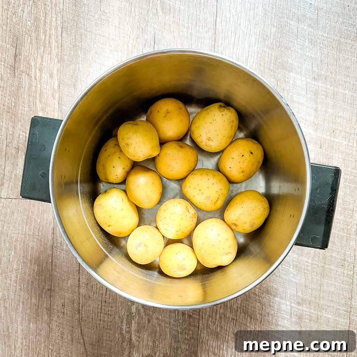 Authentic Bavarian Potato Salad with Bacon Recipe 5 yukon gold potatoes in a stock pot.