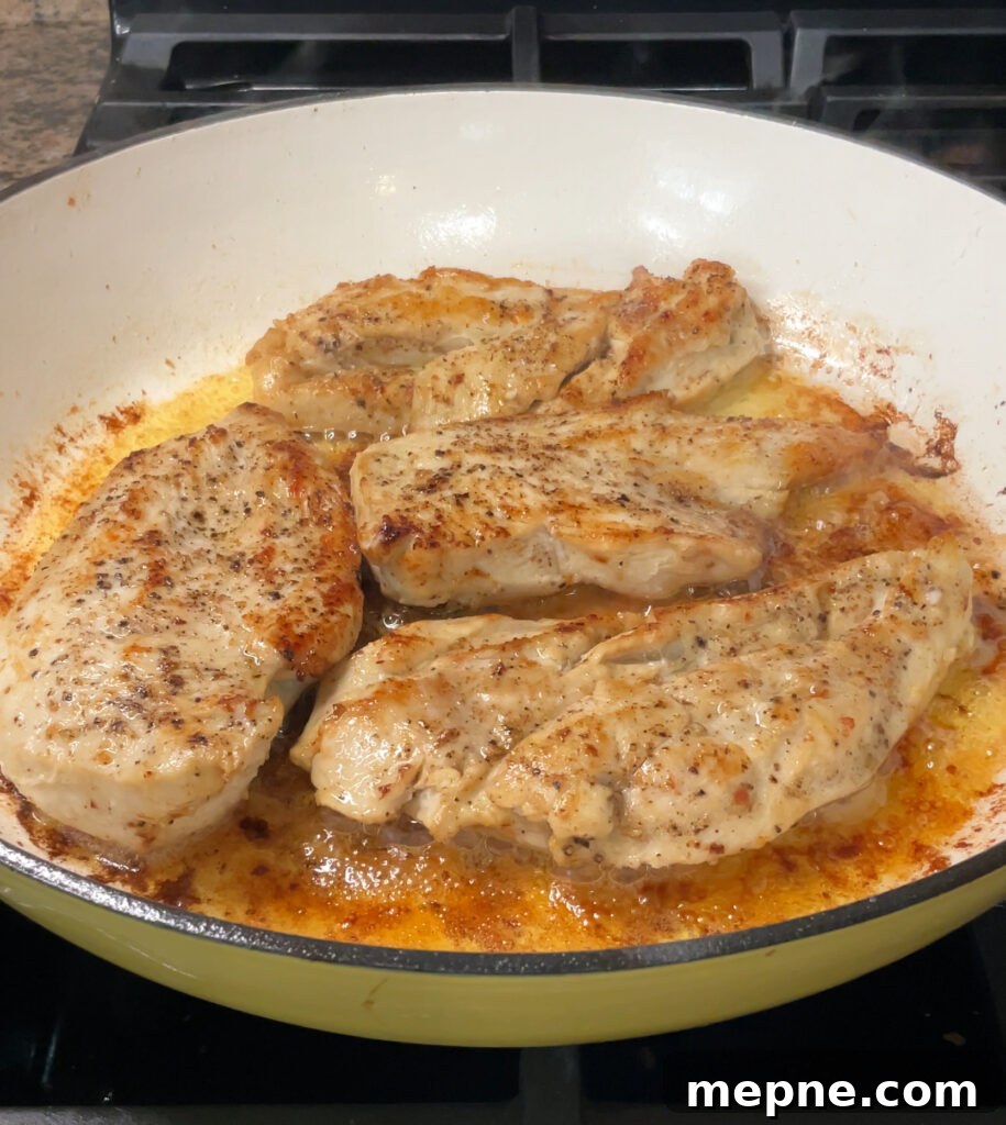 Creamy Garlic and Herb Chicken Pasta Recipe 8 chicken breasts in a skillet