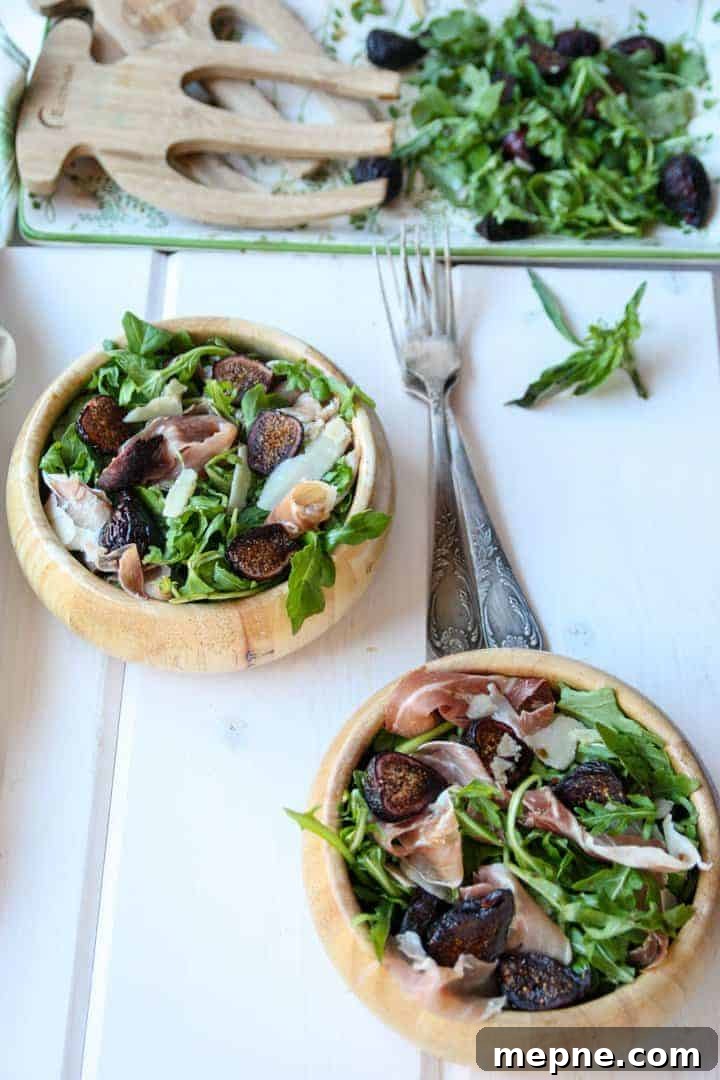 Fig, Prosciutto and Arugula Salad Recipe 5 Two wooden bowls of salad with forks