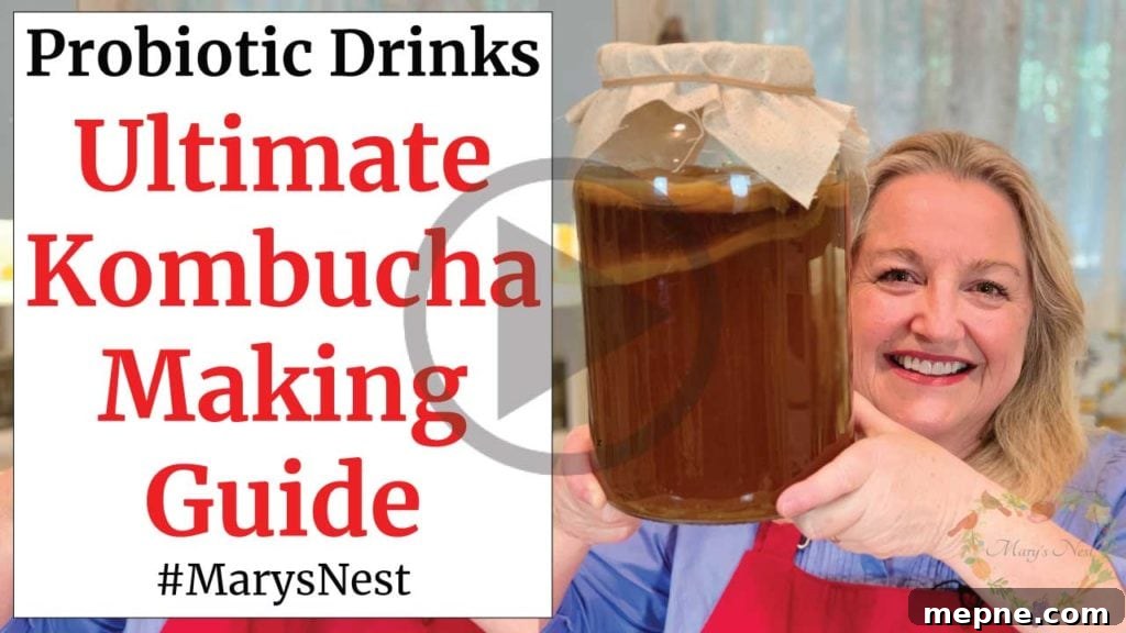 5 Shortcuts to Ferment Almost Anything at Home 3 Mary holding a jar with a Kombucha SCOBY.