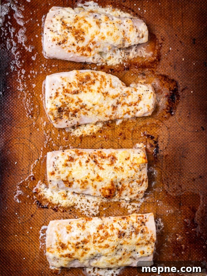Broiled Mahi Mahi with Parmesan Butter Crust 8 Four broiled mahi mahi fillets on sheet pan