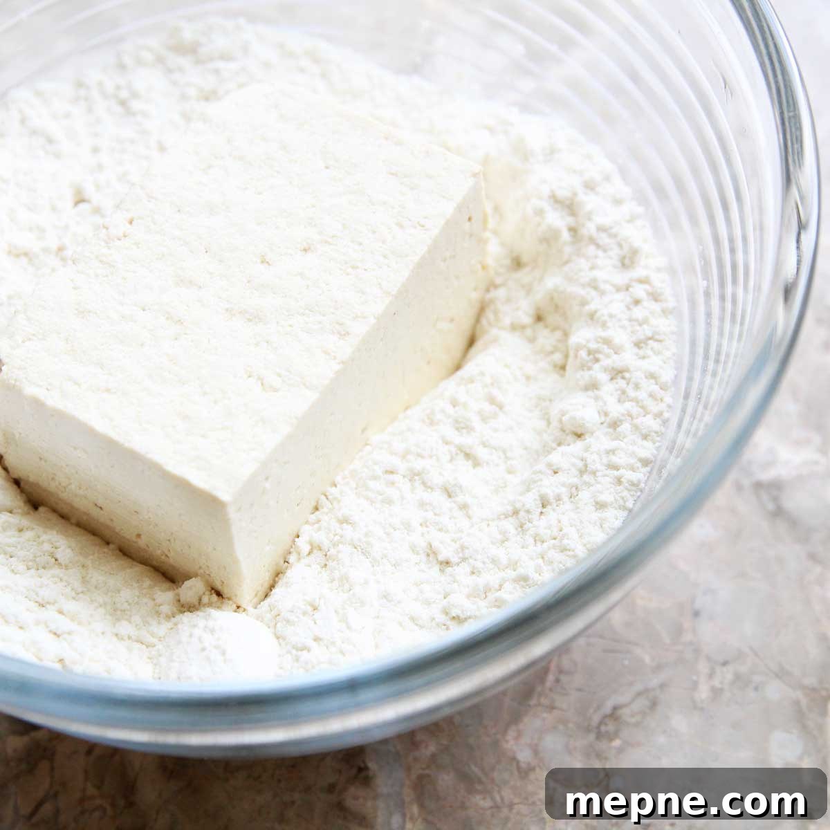 Mash tofu with flour
