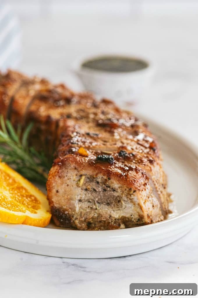 Pork Tenderloin with Orange Mustard Glaze 3 Orange Mustard Pork Tenderloin - This easy glazed tenderloin recipe is sweet and savory with orange juice and stone ground mustard. You'll never have a dry piece of pork with this homemade marinade.