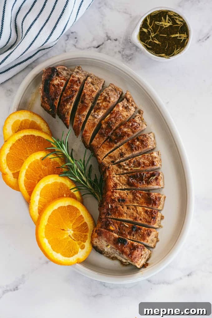 Pork Tenderloin with Orange Mustard Glaze 4 Orange Mustard Pork Tenderloin - This easy glazed tenderloin recipe is sweet and savory with orange juice and stone ground mustard. You'll never have a dry piece of pork with this homemade marinade.