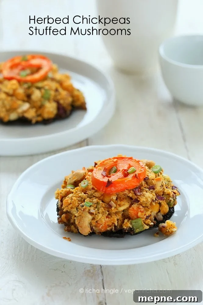 A vegan stuffed portobello mushroom on a white plate