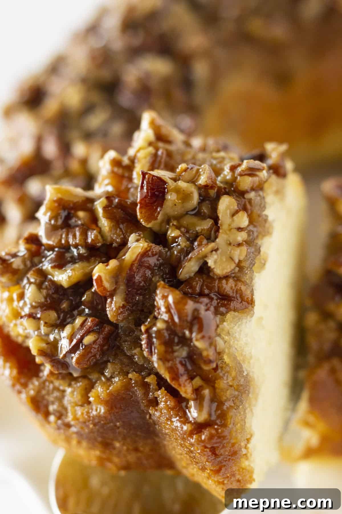 Serving a slice of Pecan Upside Down Cake.