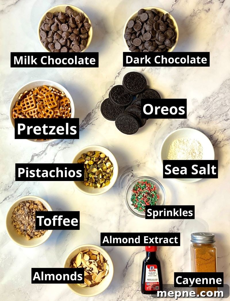 Cowboy Chocolate Christmas Bark Recipe 2 Ingredients list. Milk chocolate chips, dark chocolate chips, pretzels, Oreos, pistachios, sea salt, Christmas sprinkles, toffee pieces, sliced almonds, almond extract, and cayenne pepper.