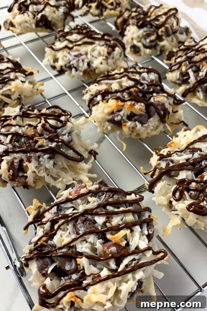 Close up of 4 ingredient almond joy cookies on a wire cooling rack.