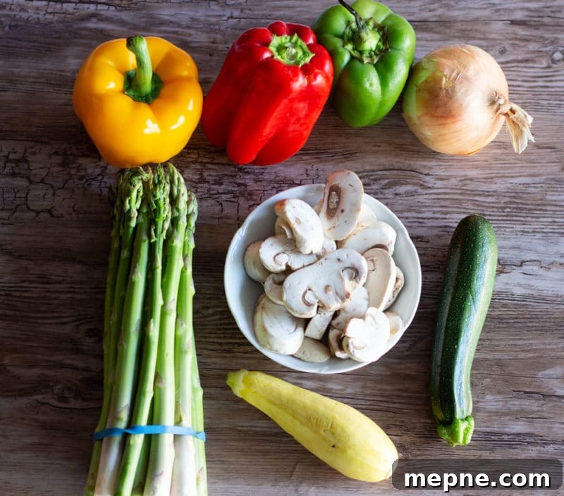 Crispy Oven Roasted Vegetables with Garlic and Herbs 3 Ingredients for Oven roasted vegetables including red, green and yellow bell pepper, asparagus, mushrooms, squash, zucchini and onion.