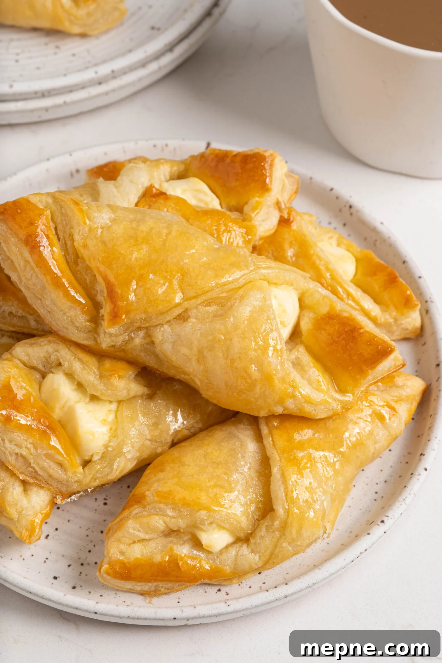 Authentic Puerto Rican Quesitos Recipe - Ready in 30 Minutes 2 A plate of quesitos.