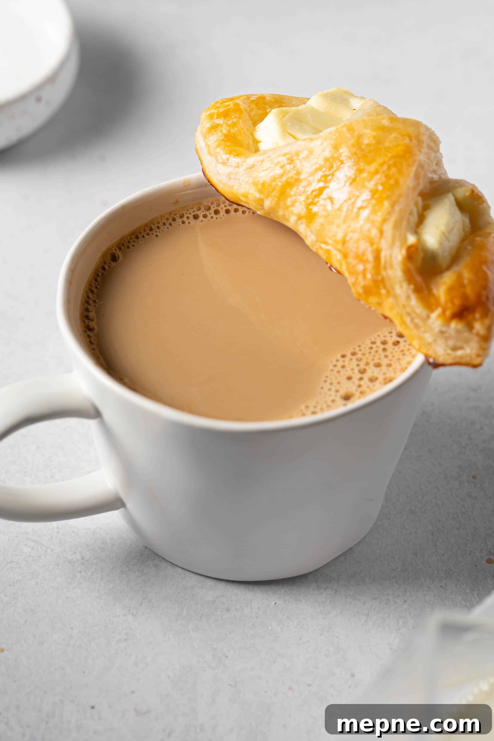 Authentic Puerto Rican Quesitos Recipe - Ready in 30 Minutes 3 a cup of coffee with a pastry