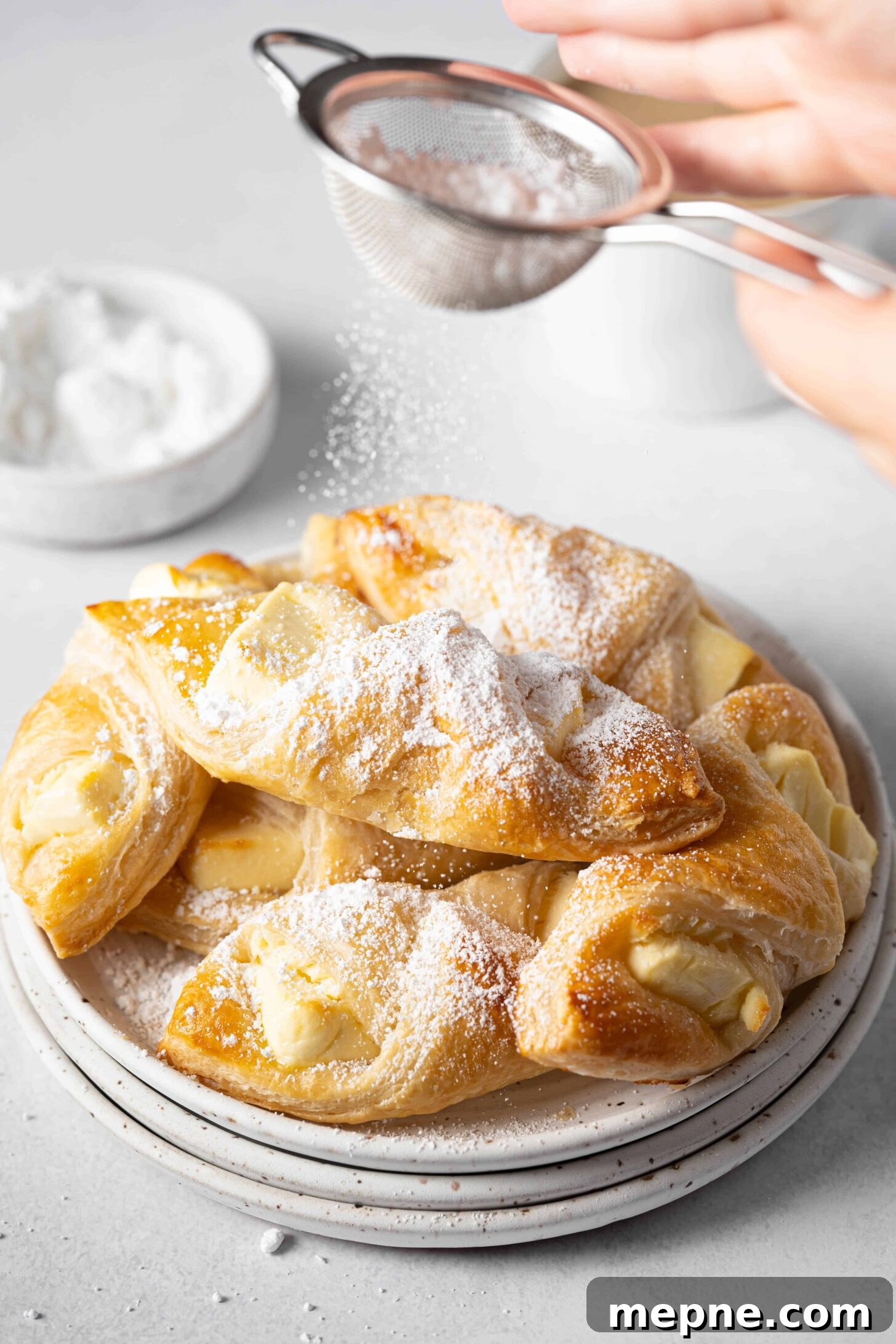 Authentic Puerto Rican Quesitos Recipe - Ready in 30 Minutes 9 powdered sugar dusting over quesitos