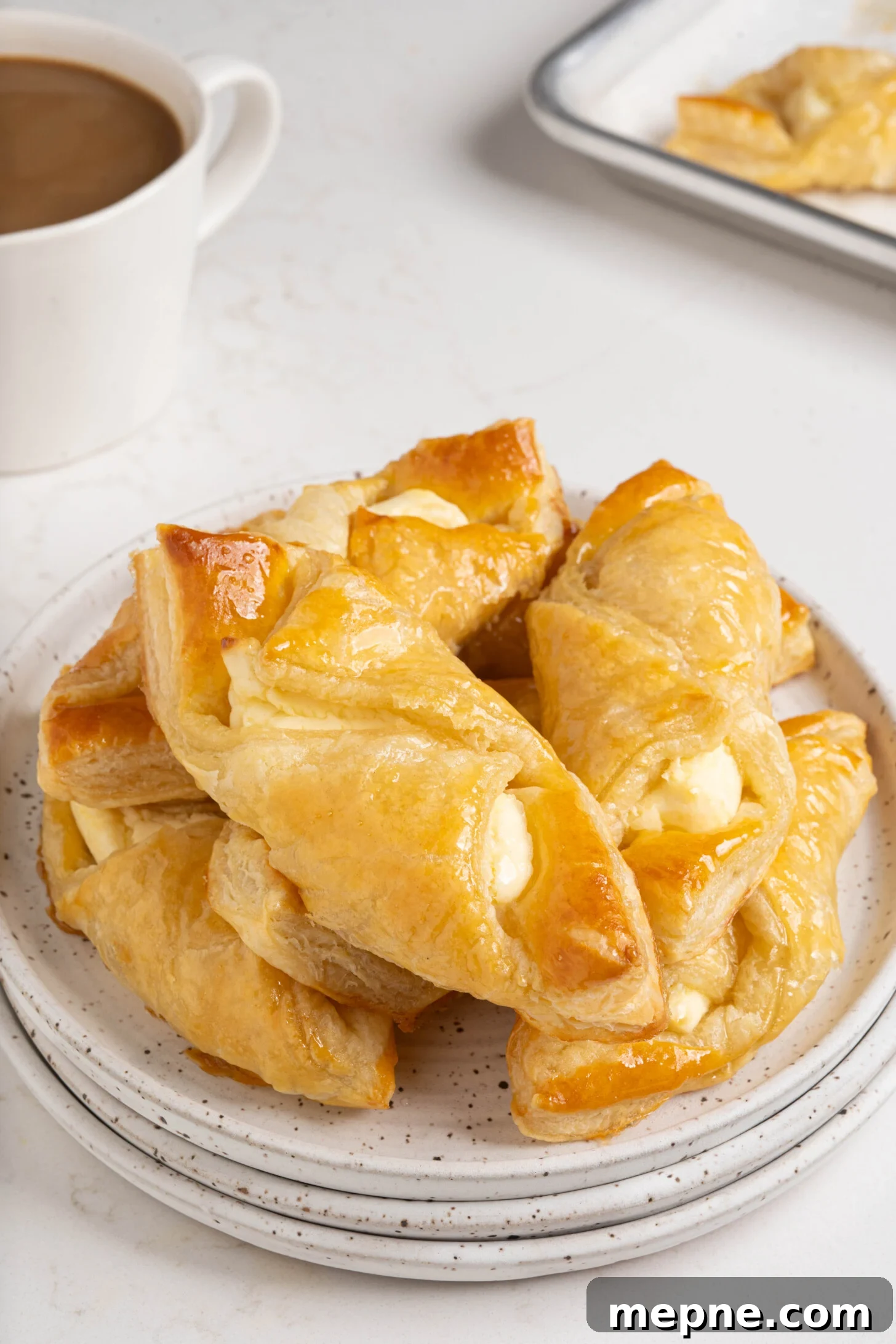 Authentic Puerto Rican Quesitos Recipe - Ready in 30 Minutes 10 A plate of quesitos.