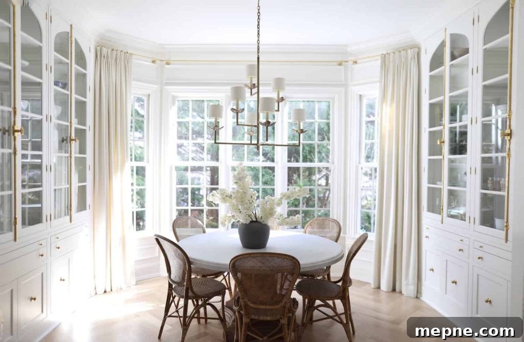 Kitchen Remodel Reveal: Before and After Transformation 20 breakfast nook with glass cabinets