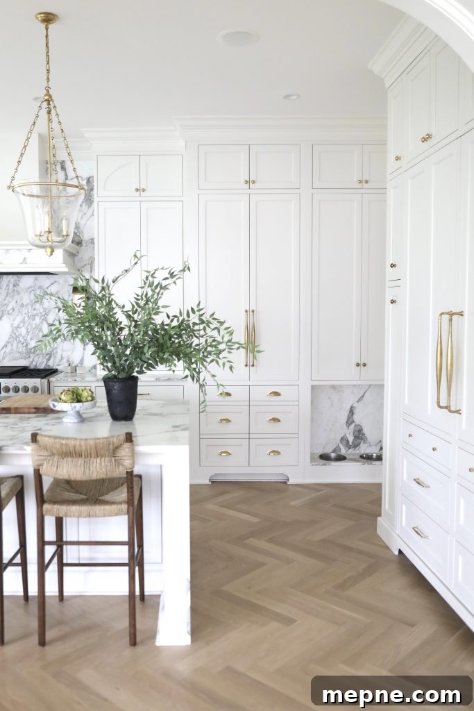 Kitchen Remodel Reveal: Before and After Transformation 5 creamy cabinets in a luxury kitchen