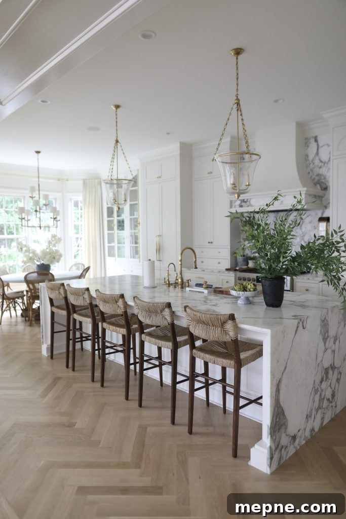 Kitchen Remodel Reveal: Before and After Transformation 7 a 10ft marble island in a luxury kitchen