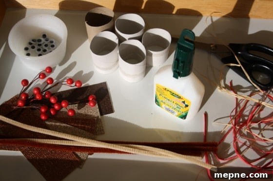 Christmas Toilet Paper Roll Reindeer Ornament for Kids 4 toilet rolls, glue, google eyes, brown paper