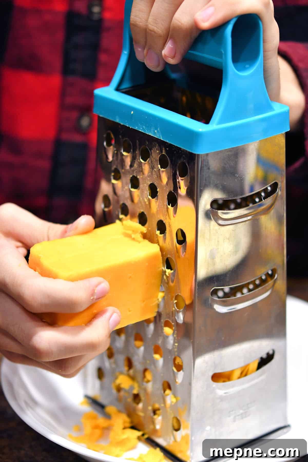 Creamy Instant Pot Cheeseburger Soup Recipe 10 shredding cheddar cheese with a box grater