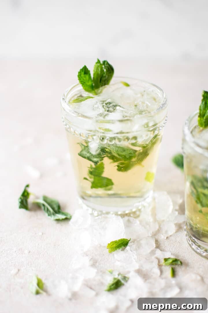 Classic Mint Julep Cocktail Recipe 3 a mint julep next to crushed ice