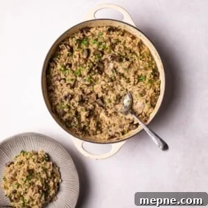Vegan Mushroom Risotto served on a plate and in a serving dish.