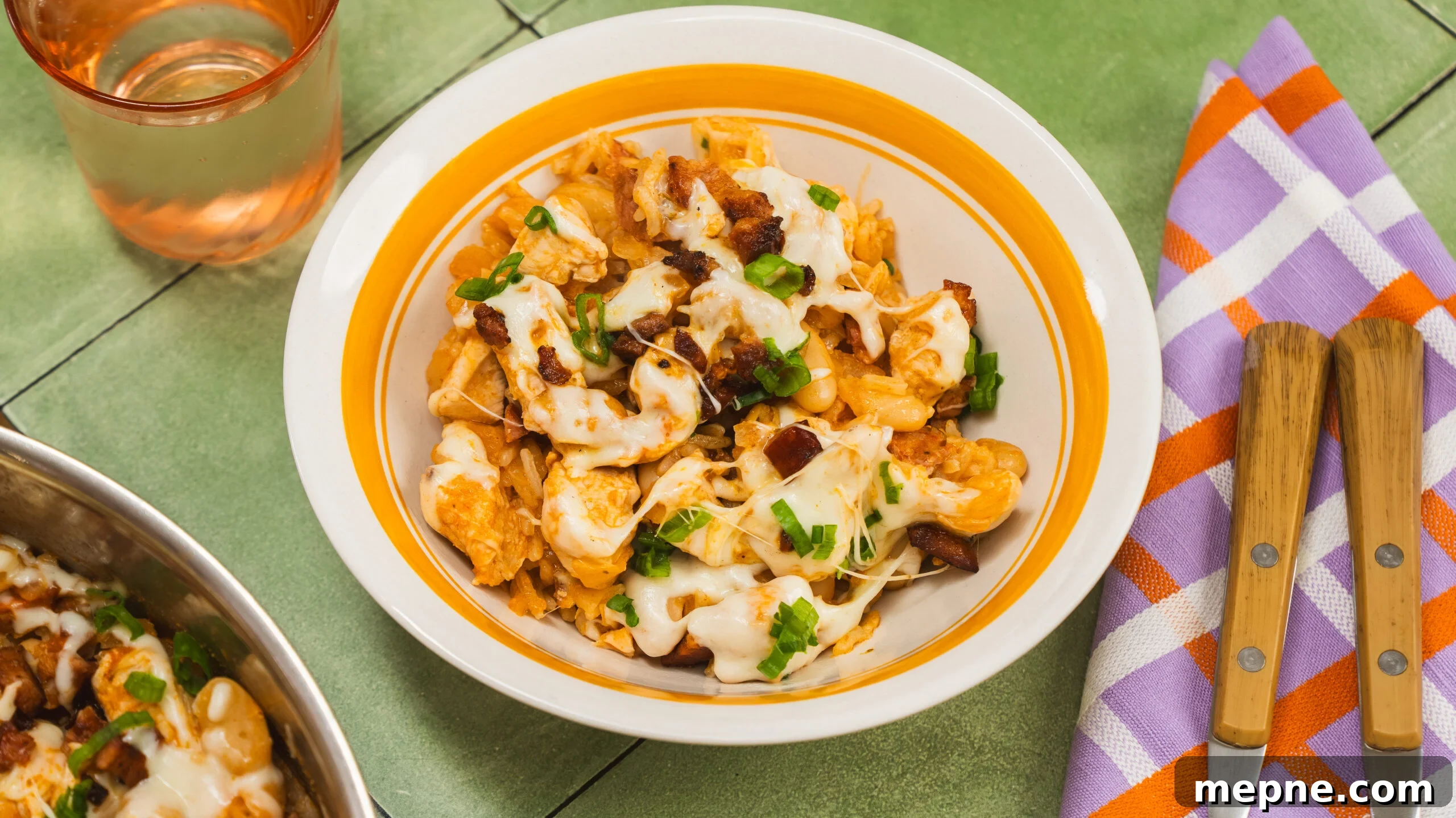 20-Minute Cheesy Chicken and Rice with Chorizo 8 Cheesy chicken and rice skillet, cozy and ready to enjoy