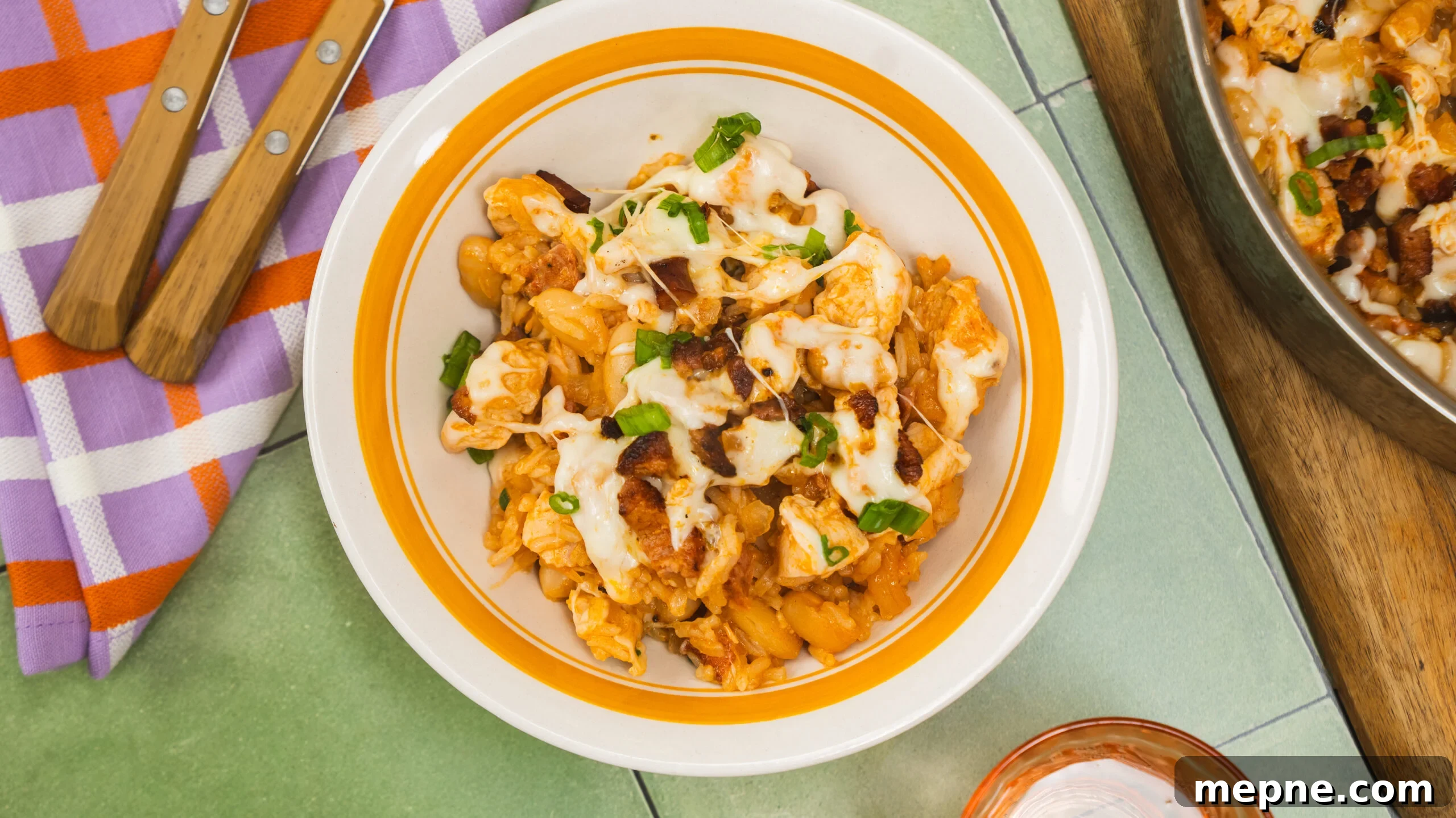 20-Minute Cheesy Chicken and Rice with Chorizo 6 Bowl of cheesy chicken and rice, ready to serve
