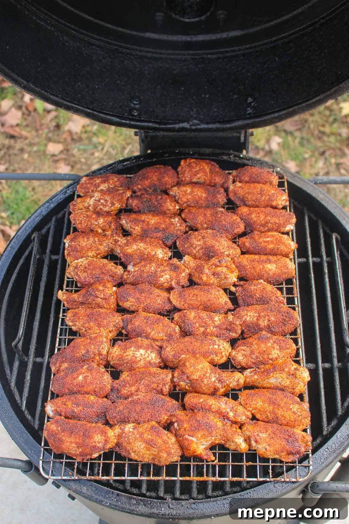 The wings set on the smoker ready to get cooking.