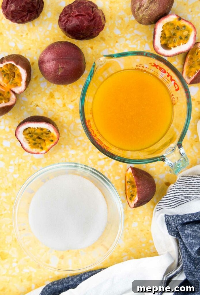 Homemade Passion Fruit Sauce Recipe for Desserts 3 Ingredients to make passion fruit coulis in pourable containers on a yellow surface surrounded by purple passion fruits
