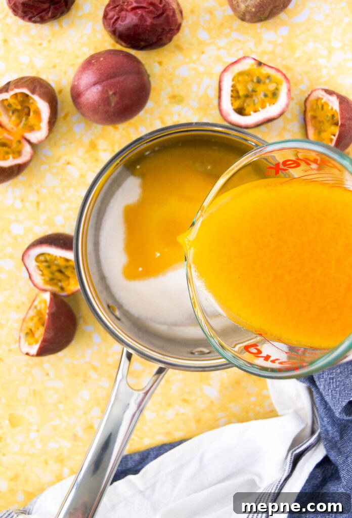 Homemade Passion Fruit Sauce Recipe for Desserts 4 passion fruit pulp is poured over sugar in a saucepan on a yellow surface
