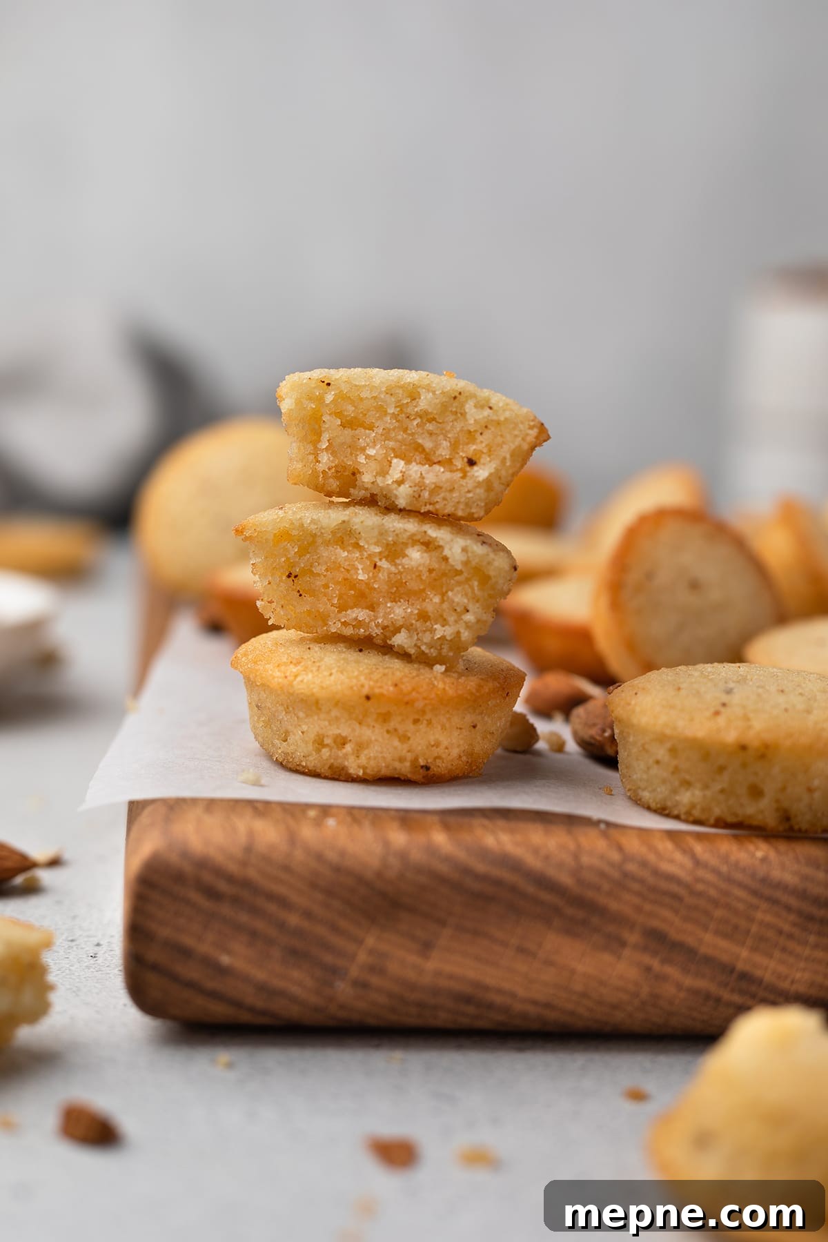 Authentic French Financiers Recipe: Classic Almond Tea Cakes 5 Stack of French financiers on a serving board