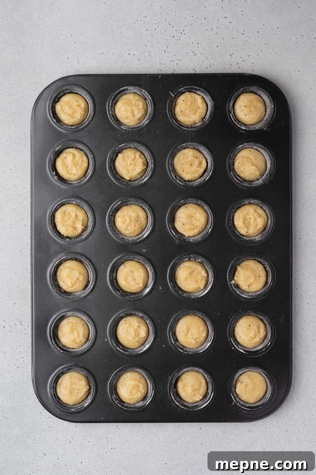 Authentic French Financiers Recipe: Classic Almond Tea Cakes 8 Madeleine tin cavities filled with financier batter