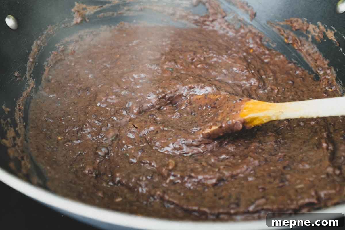 Mexican Tlayudas Black beans, pureed and refried for Mexican tlayudas