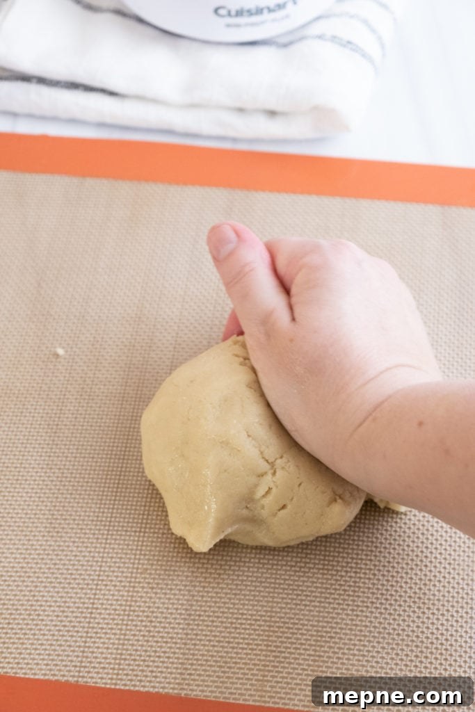 Homemade Marzipan Recipe Without Eggs or Cooking 20 Rolling marzipan into a log