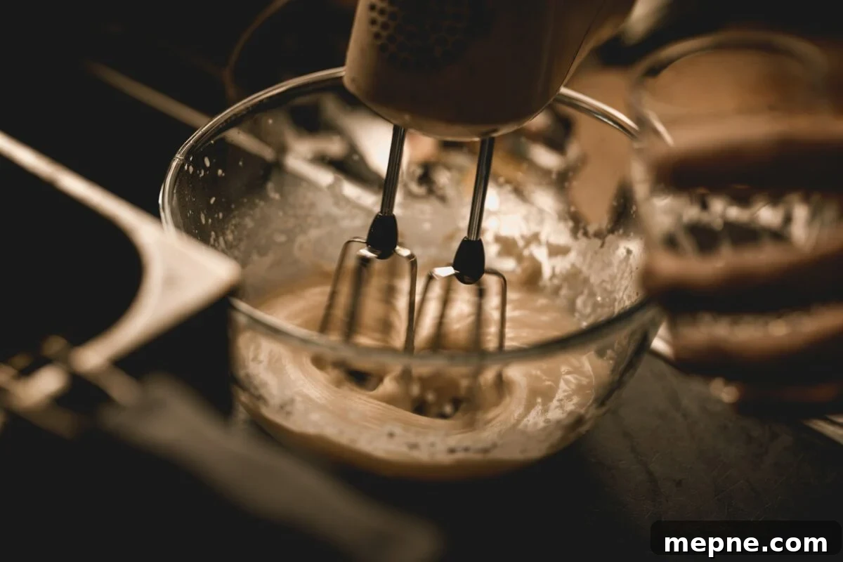 Moist Almond Flour Coffee Cake Recipe: Gluten-Free, Dairy-Free 14 Mixing bowl with batter and mixer.