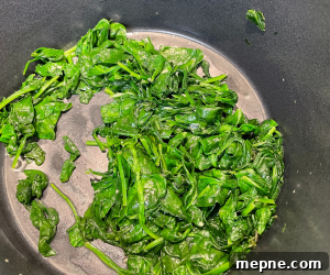 Creamy Spinach Dip with Garlic and Parmesan 7 Spinach cooking