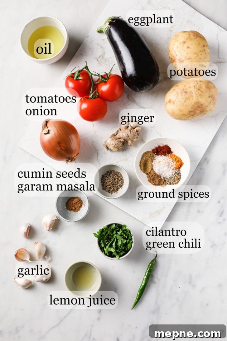 Aloo Baingan: Indian Eggplant and Potato Curry 3 Ingredients for Aloo Baingan on a marbled surface