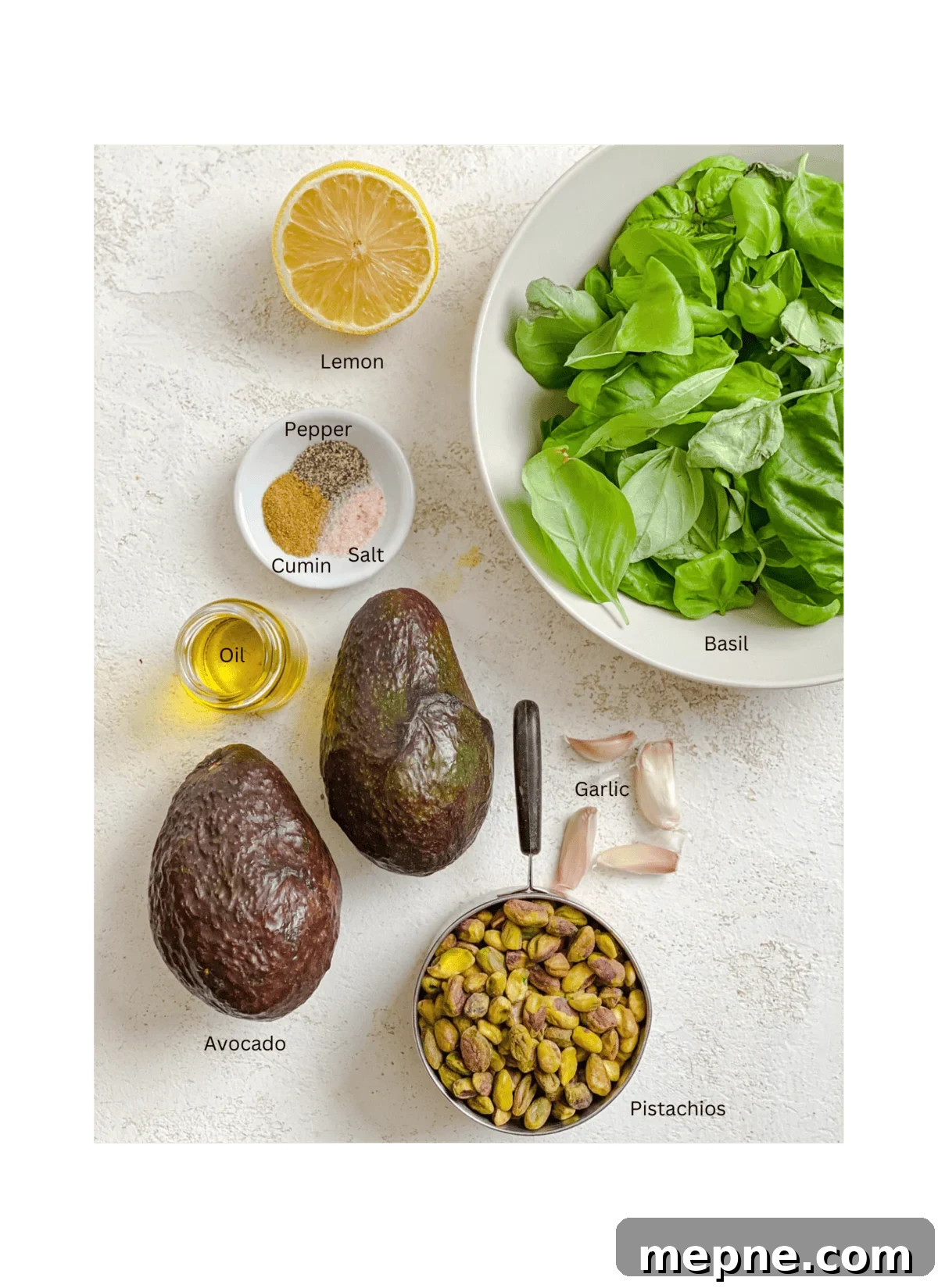 Creamy Avocado Pesto Pasta Recipe 3 ingredients for Amazing Avocado Pesto Pasta measured out on a white surface