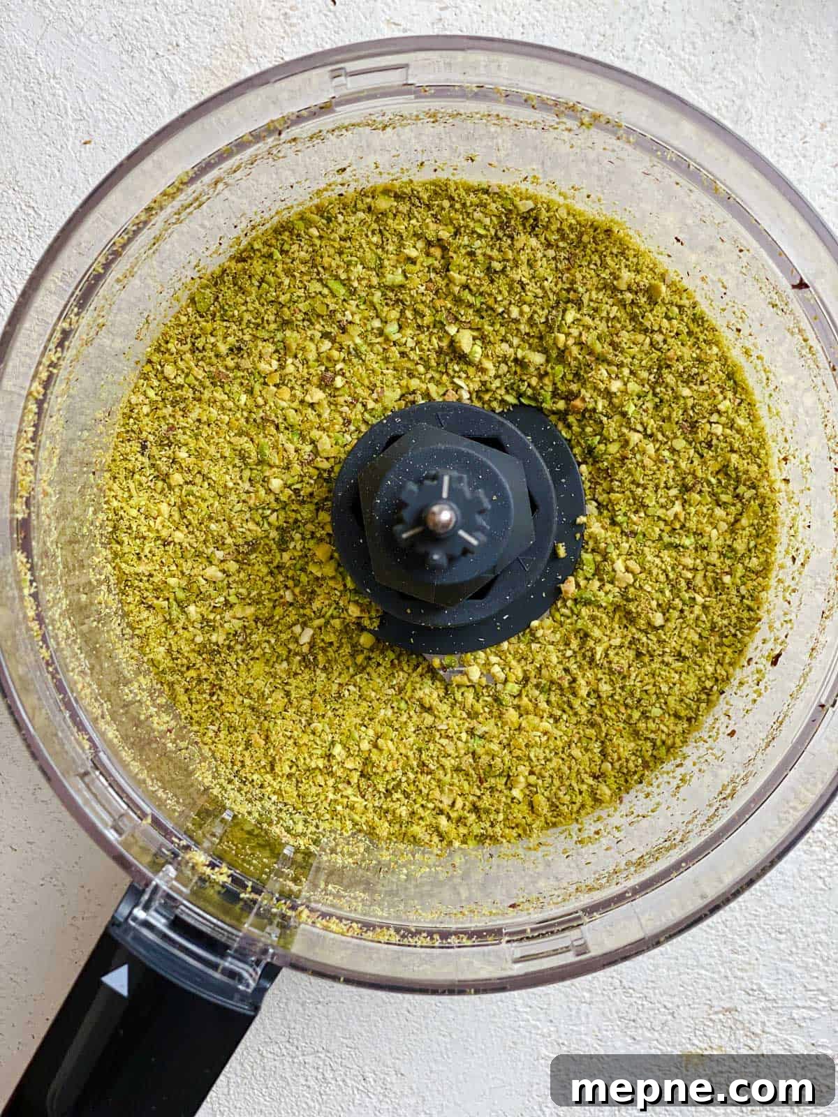 Creamy Avocado Pesto Pasta Recipe 5 process shot of Amazing Avocado Pesto Pasta ingredients in food processor