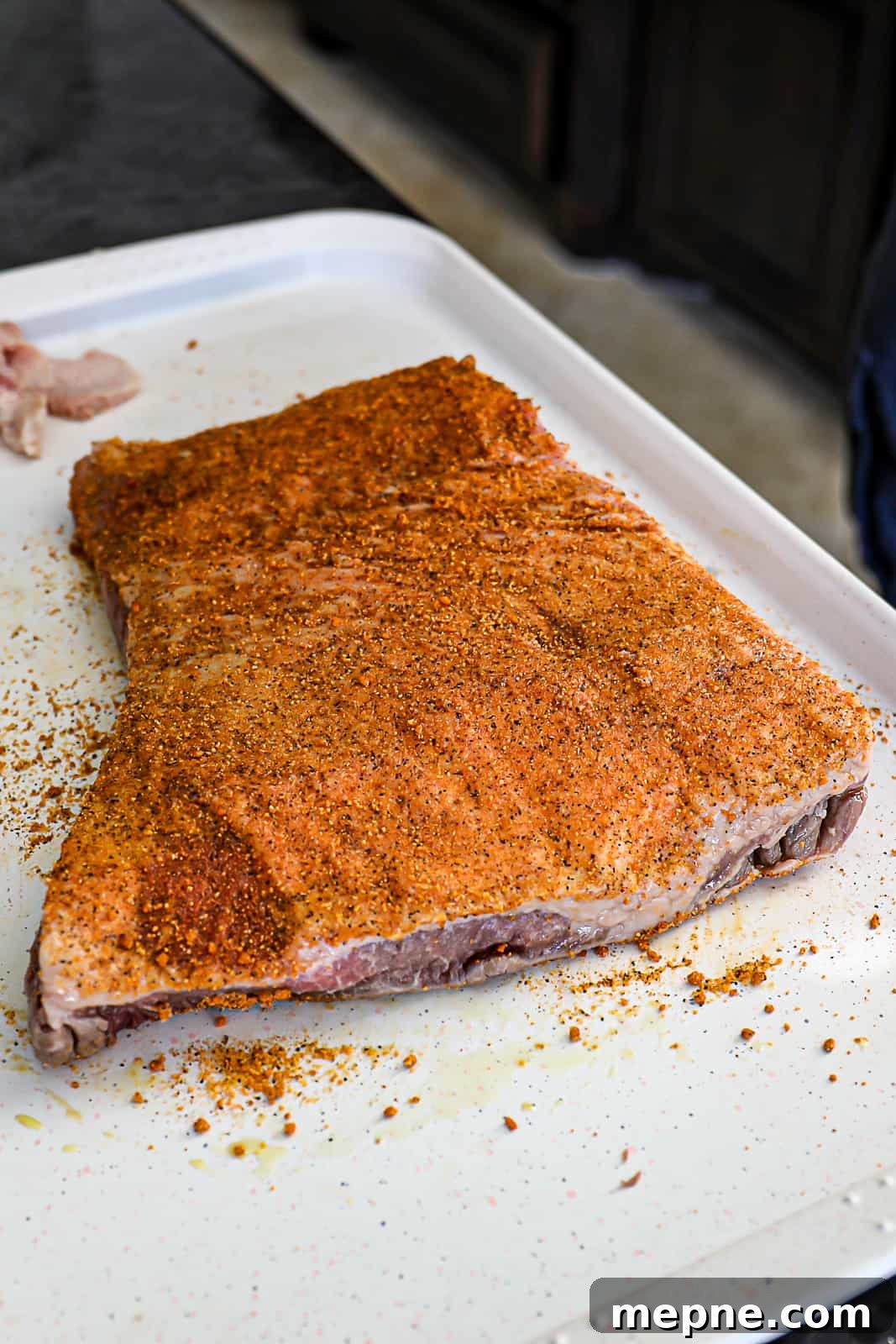 Seasoned Brisket With BBQ Rub On A Tray
