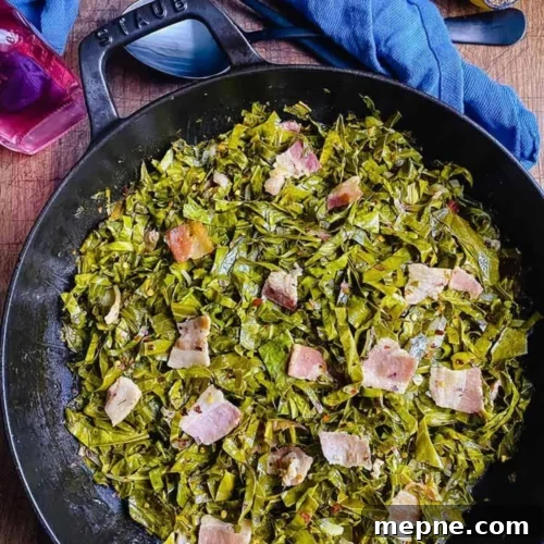 Smoked Side Dishes for BBQ and Cookouts 19 A skillet filled with greens and bacon
