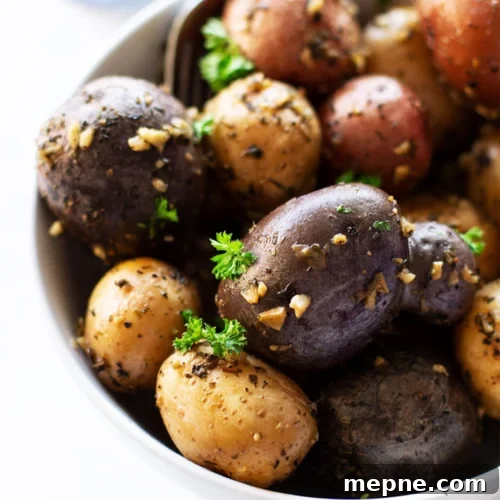 Smoked Side Dishes for BBQ and Cookouts 26 A bowl filled with potatoes and herbs