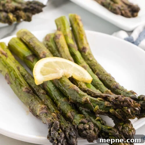 Smoked Side Dishes for BBQ and Cookouts 5 Grilled asparagus with lemon wedges