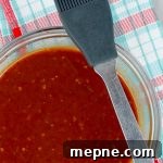 Homemade Chipotle Brown Sugar BBQ Sauce Recipe 7 Homemade Chipotle Brown Sugar Barbecue Sauce in a clear bowl with a plaid napkin