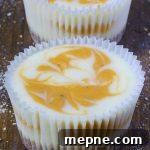 Two Pumpkin Swirled Cheesecakes