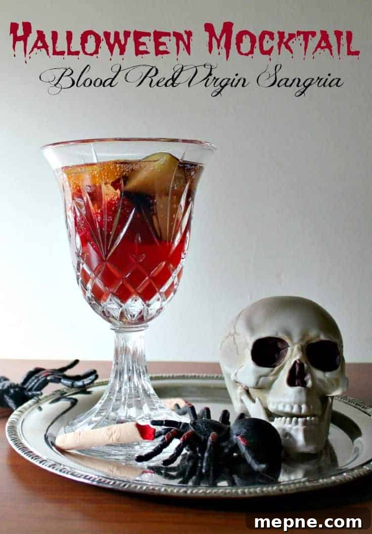 Bloody looking mocktail with a skull and spider. 